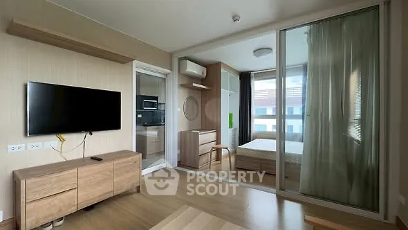 Modern studio apartment with open layout and natural light