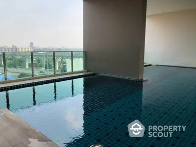 Luxurious indoor pool with stunning city view and modern design