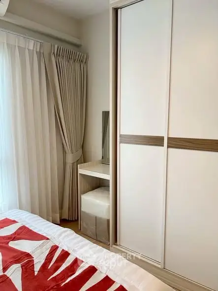 Cozy bedroom with modern wardrobe and natural light