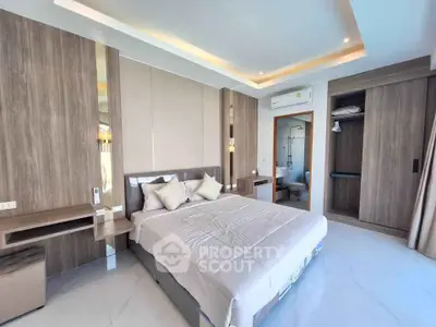 Luxurious modern bedroom with elegant design and ample natural light