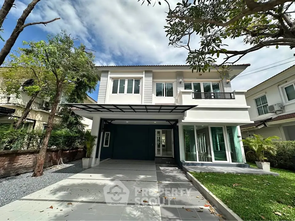 Stunning two-story modern house with spacious driveway and lush garden