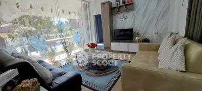 Luxurious living room with modern decor and garden view