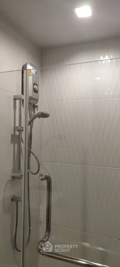 Modern bathroom shower with sleek design and chrome fixtures