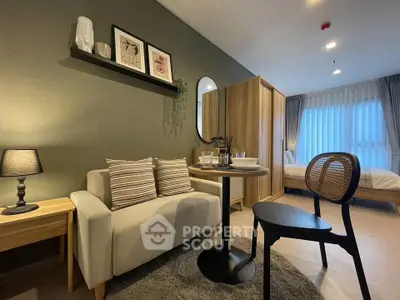 Modern studio apartment with cozy living area and stylish decor