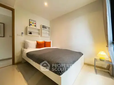 Cozy modern bedroom with stylish decor and natural light