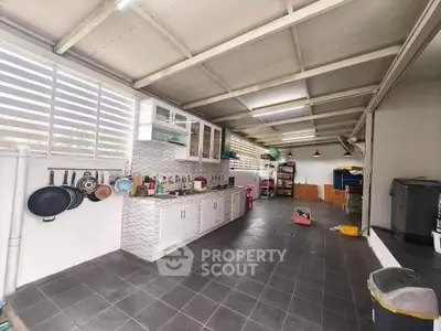 Spacious kitchen with modern design and ample storage space
