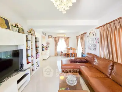 Spacious living room with leather sofa and elegant decor in a modern home
