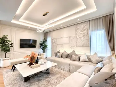 Luxurious modern living room with elegant decor and plush seating