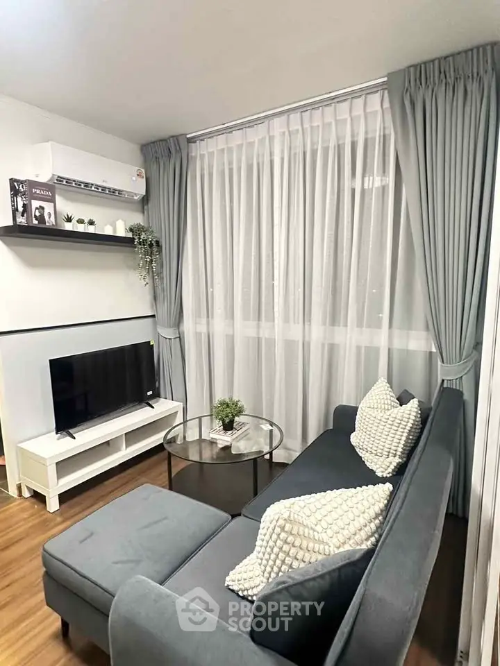 Cozy living room with modern decor and natural light