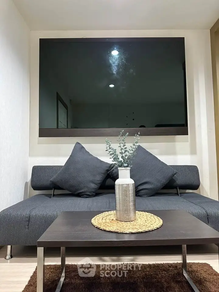 Modern living room with sleek sofa and stylish decor