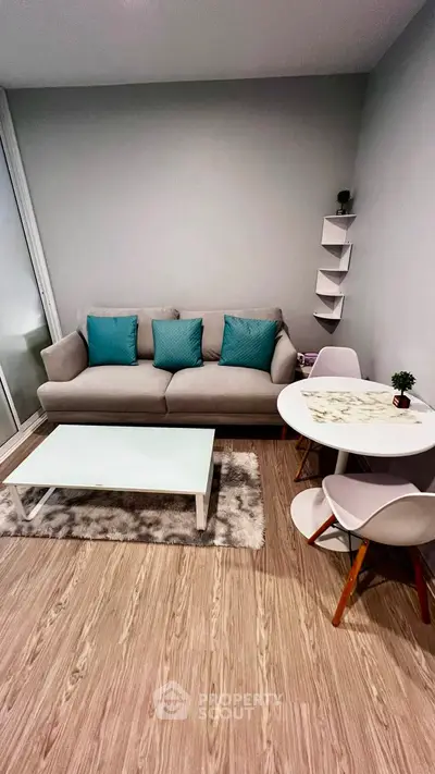 Cozy living room with modern decor and stylish furniture, perfect for relaxation and entertaining.
