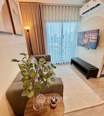 Modern living room with city view, stylish decor, and wall-mounted TV