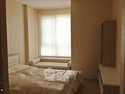 Cozy bedroom with natural light and minimalist decor