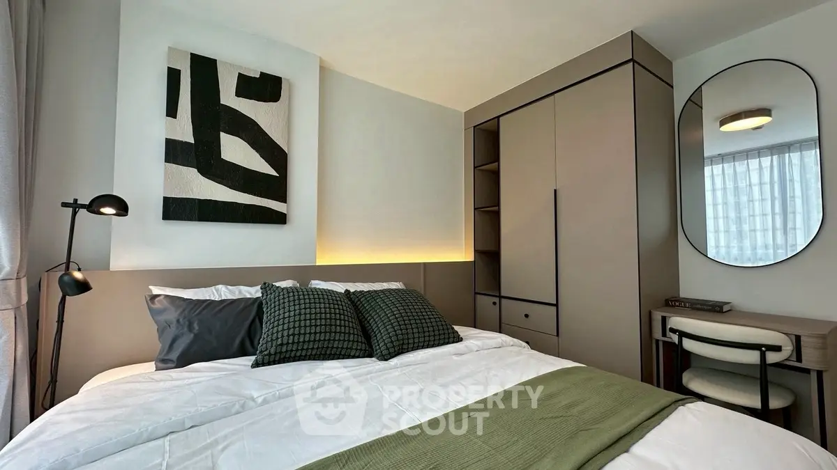 Modern bedroom with stylish decor and built-in wardrobe