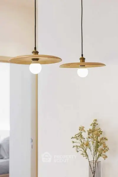 Modern interior with stylish pendant lights and minimalistic decor