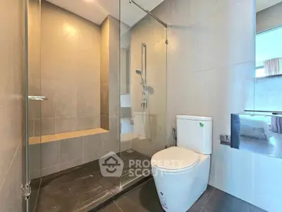 Modern bathroom with glass shower and sleek design