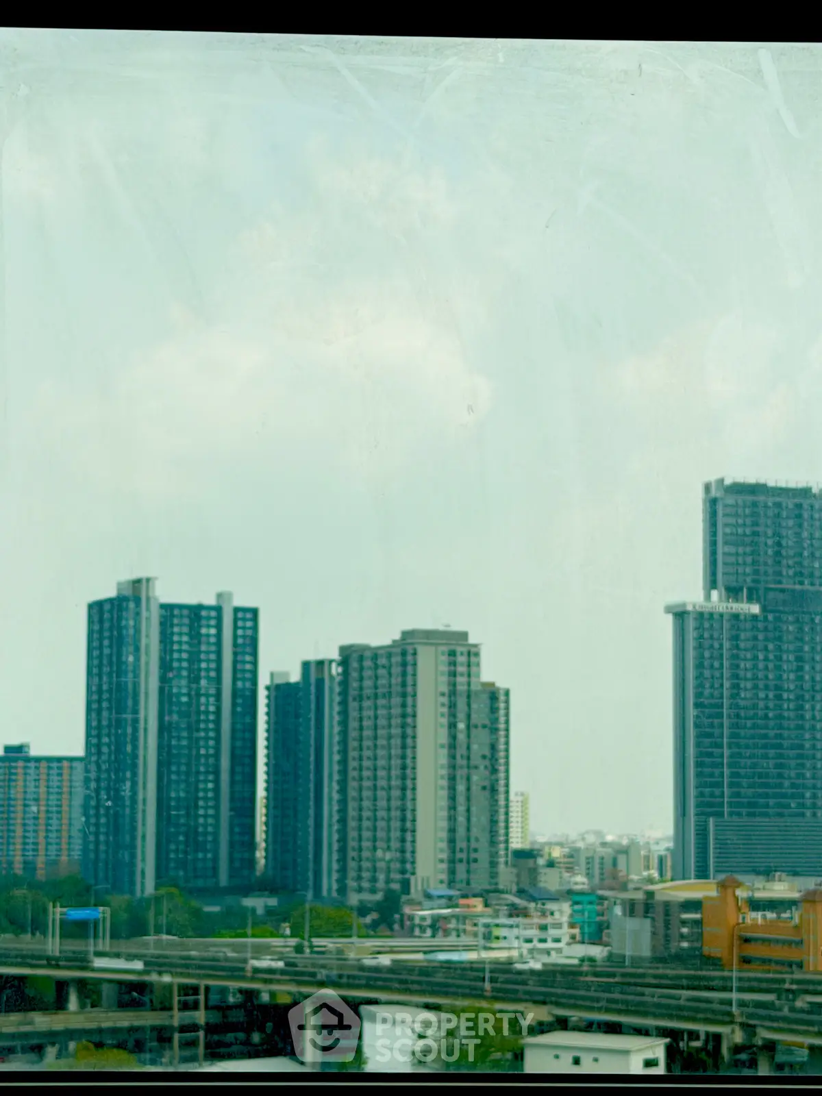 Stunning cityscape view of modern high-rise buildings under a clear sky.