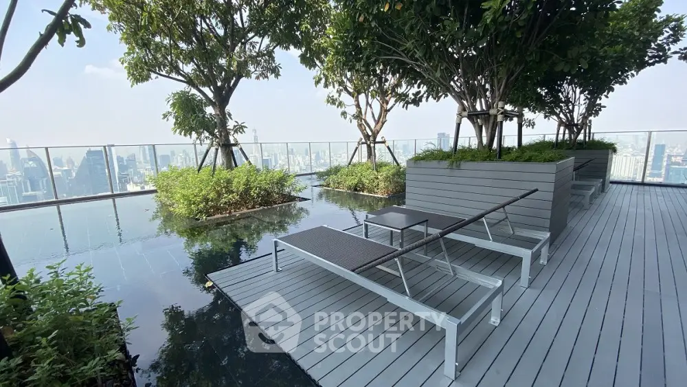 Luxurious rooftop terrace with stunning city views and modern lounge seating.