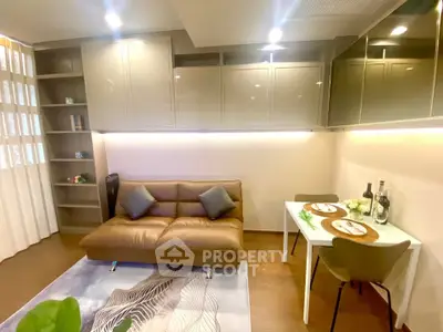 Modern living room with sleek cabinetry and cozy dining area