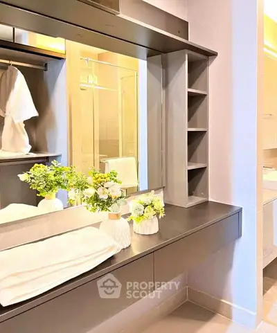 Elegant bathroom vanity with modern shelving and floral decor