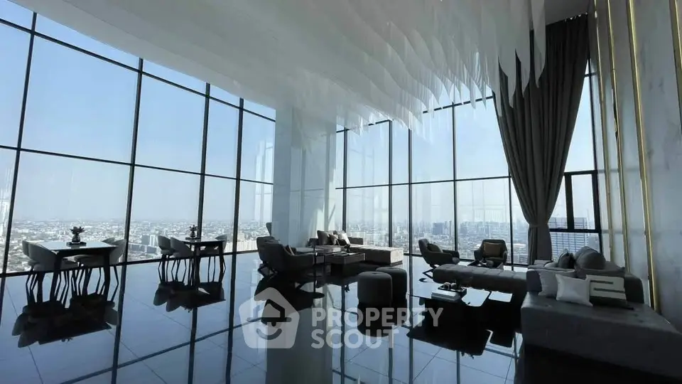 Luxurious penthouse living room with panoramic city views and modern decor.