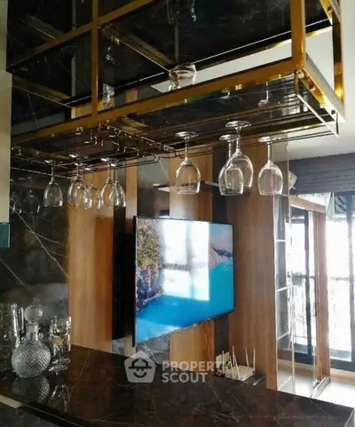 Luxurious modern kitchen with elegant glass rack and marble countertop