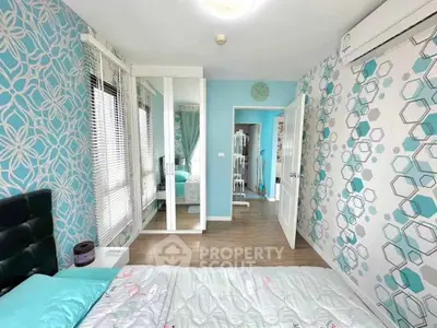 Bright and stylish bedroom with modern decor and mirrored wardrobe