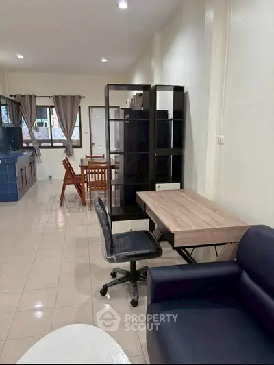 Spacious living room with modern furniture and natural light