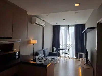 Modern living room with sleek furniture and natural light, perfect for urban living.