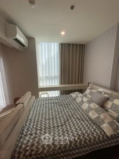 Cozy bedroom with modern decor and natural light