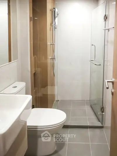 Modern bathroom with sleek design and glass shower enclosure