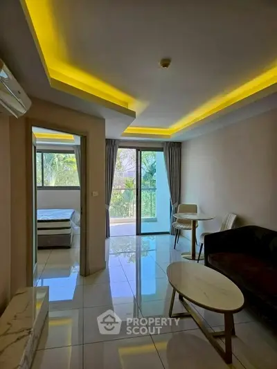 Modern living room with sleek furniture and balcony view