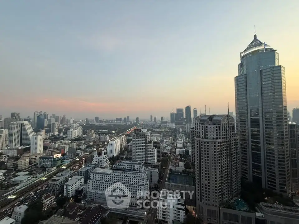 Stunning cityscape view showcasing modern skyscrapers at sunset, perfect for urban living enthusiasts.