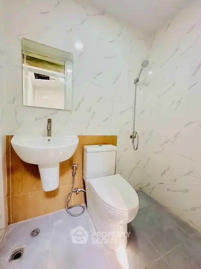 Modern bathroom with sleek fixtures and elegant tile design