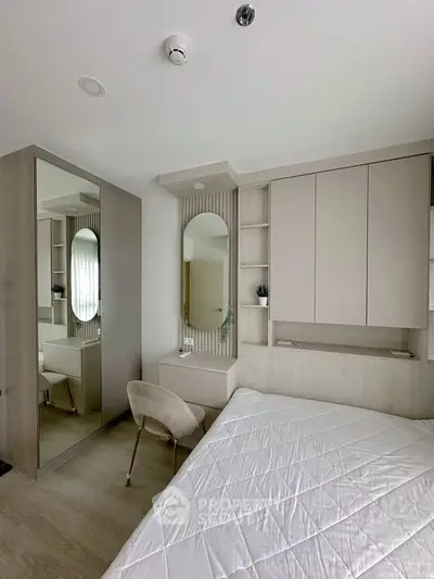 Modern bedroom with stylish decor and built-in storage solutions