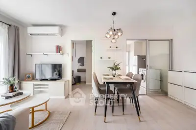 Modern living room with dining area, stylish furniture, and natural light, perfect for contemporary living.