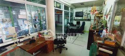 Spacious office interior with modern desks and chairs, ideal for productivity and collaboration.