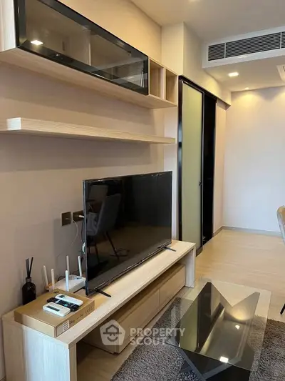 Modern living room with sleek TV unit and stylish decor