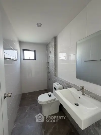 Modern bathroom with sleek fixtures and natural light