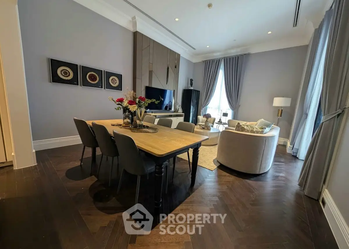 Luxurious living room with elegant dining area and stylish decor