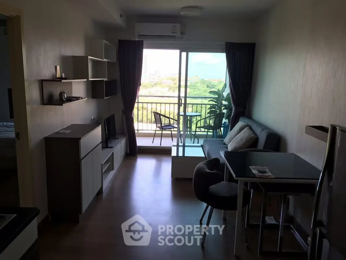 Modern living room with balcony view in stylish apartment