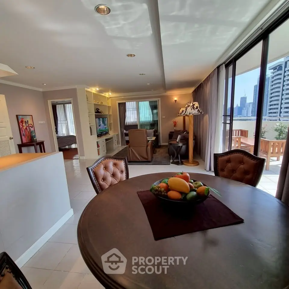 Spacious living room with city view and elegant dining area in luxury apartment