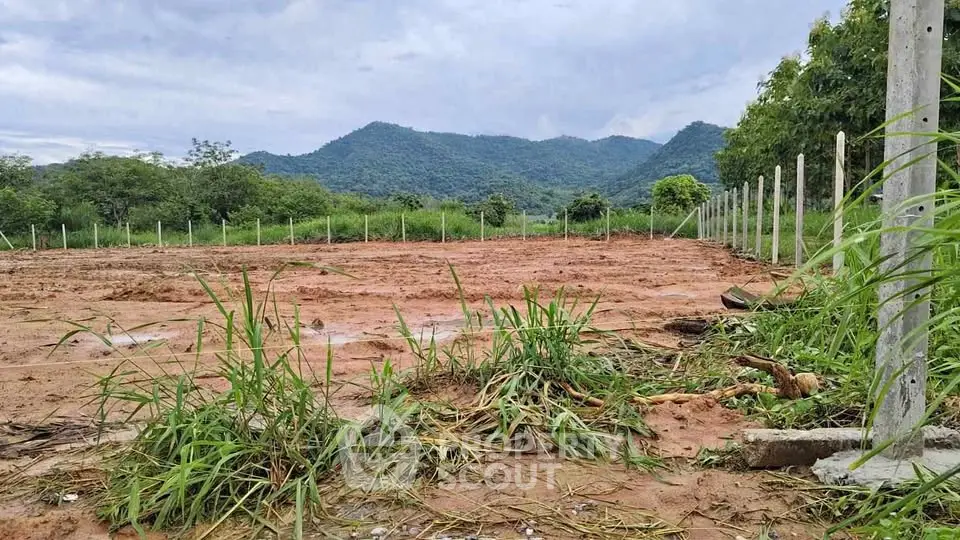 Scenic land plot with mountain views, ideal for development or investment.