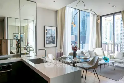 Luxurious modern living room with open kitchen and stunning city view, featuring elegant decor and floor-to-ceiling windows.