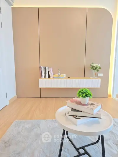 Modern living room with minimalist decor and stylish floating shelf