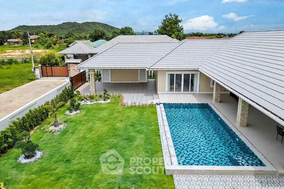 Stunning modern home with private pool and lush garden, perfect for luxury living.