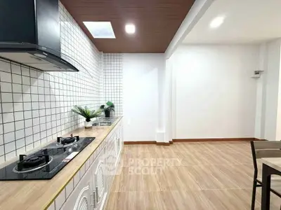 Modern kitchen with gas stove and sleek design