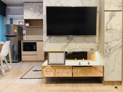 Modern living room with marble accents and built-in TV unit