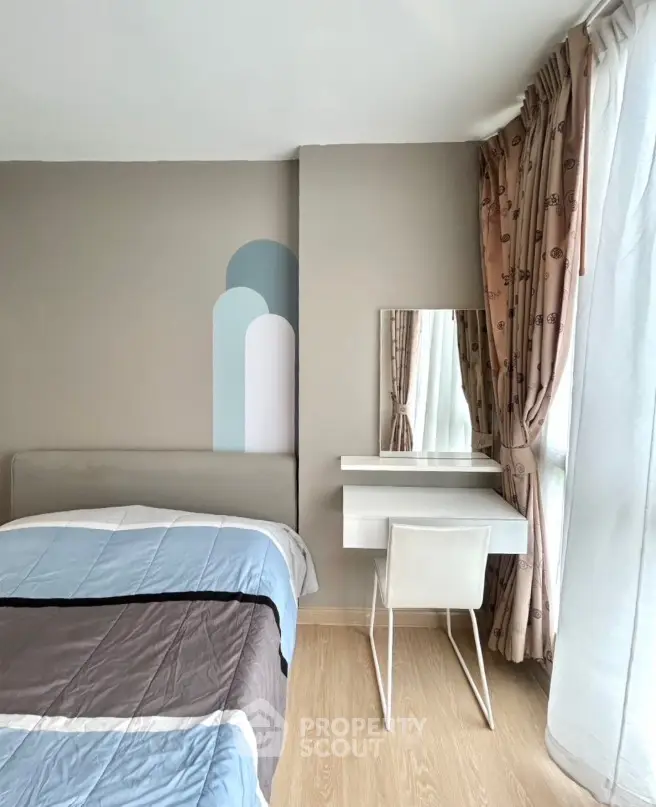 Cozy bedroom with modern decor and natural light