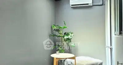 Modern minimalist room with air conditioning and stylish decor